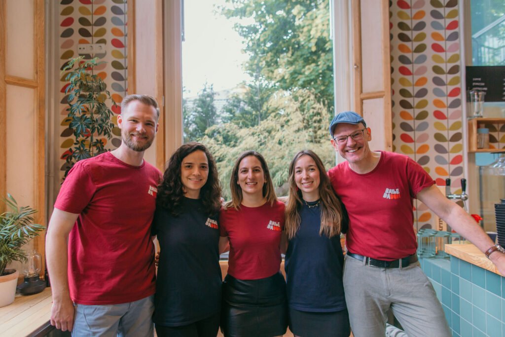 The Baile da Dom volunteer team in their red and black t-shirts